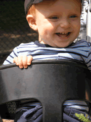 Nick enjoys swinging and fountains