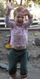 Holden in pink top and green bay packers pants